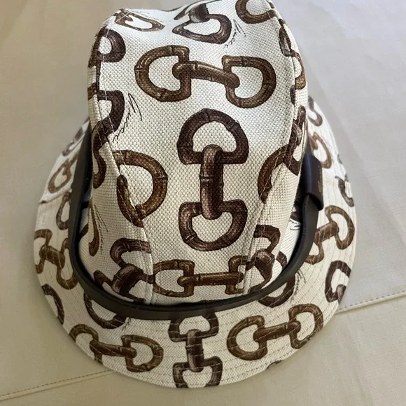 Gucci Brown and White Bucket Hat with Iconic Design Explore a Gucci Brown GG Supreme Canvas Bucket Hat - M  main image 4